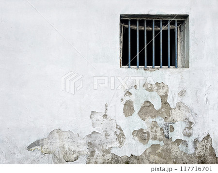 White stucco wall with a window detai, texture background White stucco wall with a window detai, texture background 117716701