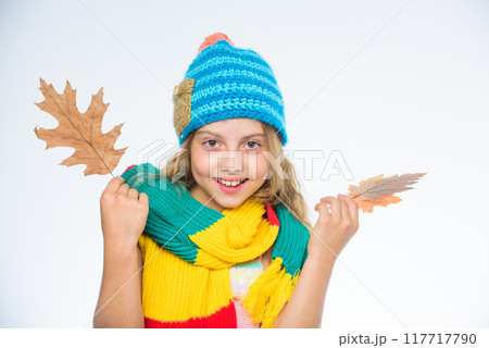 Fashion accessory concept. Fashion trend concept. Girl cute face wear fashion knitted hat Fashion accessory concept. Fashion trend concept. Girl cute face wear fashion knitted hat 117717790