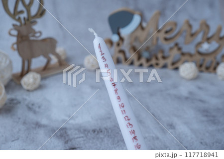 New year and Christmas preparation. Twenty four days advent candles on table. Handmade eco-friendly decor. Sustainable Christmas decoration 117718941