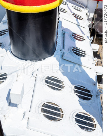 closed portholes on deck of old ship closed portholes on deck of old ship 117720472