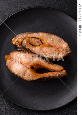 Delicious red salmon r trout fish grilled with spices and herbs 117720512