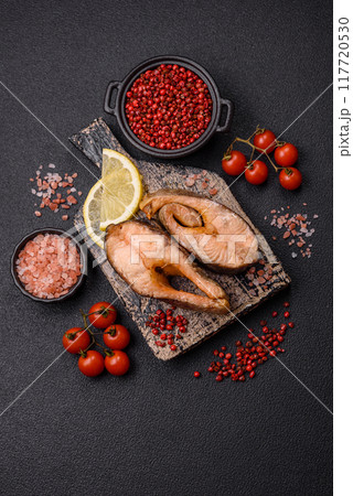 Delicious red salmon r trout fish grilled with spices and herbs Delicious red salmon r trout fish grilled with spices and herbs 117720530