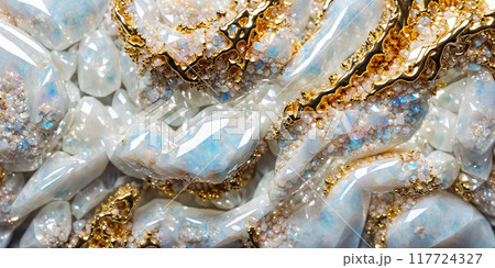 Natural white opalescent porcelain stone mixed with veins of gold, close up, beige and golden texture. Wallpaper background, white marble, decorative rock pattern. Natural white opalescent porcelain stone mixed with veins of gold, close up, beige and golden texture. Wallpaper background, white marble, decorative rock pattern. 117724327