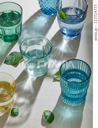 various colorful water glasses 117724773