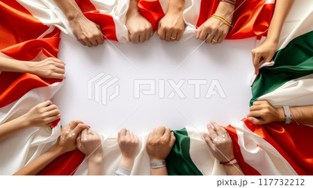 Unity and Patriotism: Hands Holding Indian Flag Fabric in Celebration of India Independence Day Unity and Patriotism: Hands Holding Indian Flag Fabric in Celebration of India Independence Day 117732212