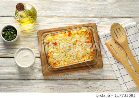 Concept of tasty and delicious homemade food - potato casserole 117733093