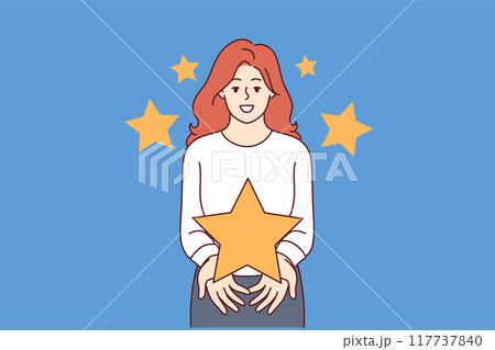 Feedback from woman showing large star, symbolizing high rating for quality product 117737840