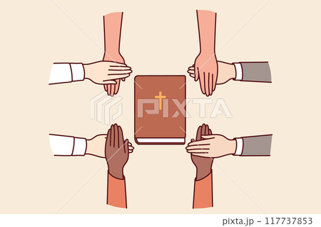 Hands of christian believers held bible, which allows them to commune with lord. 117737853