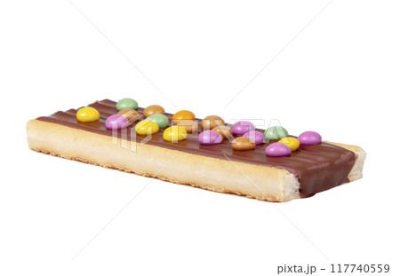 Chocolate bar snack with colorful drops or dragee isolated on the white 117740559