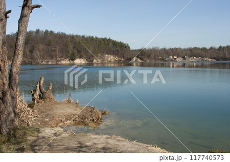 Bright landscape of lake with blue water 117740573