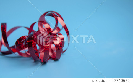 party ribbon confetti on blue party ribbon confetti on blue 117740670