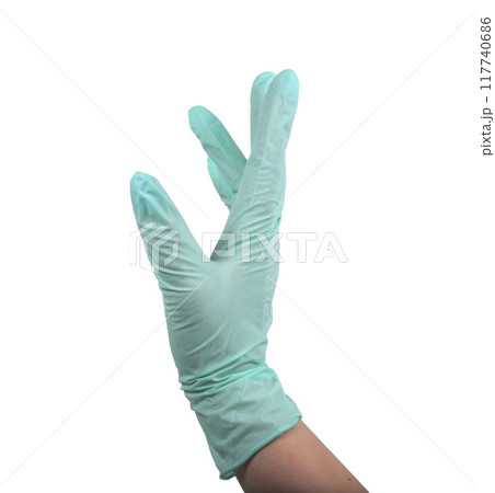 Green rubber glove on hand isolated on the white Green rubber glove on hand isolated on the white 117740686