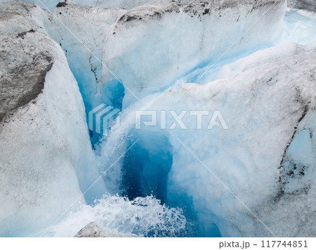 Mendenhall Glacier Crevasse Showcasing Vibrant Blue Depths 117744851