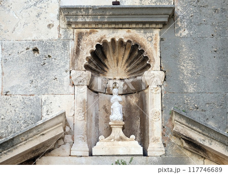 Our Lady on the portal of St Michael church, in the old town of Korcula, Dalmatia, Croatia 117746689
