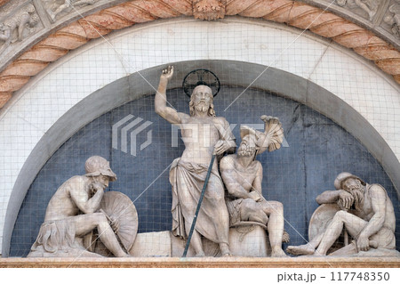 Lunette of the Resurrection, facade of San Petronio Basilica by Alfonso Lombardi in Bologna, Italy 117748350