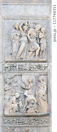 Escape of Loth by Niccolo Tribolo up and Birth of Esau and Jacob by Alfonso Lombardi down, left door of San Petronio Basilica in Bologna, Italy 117748351