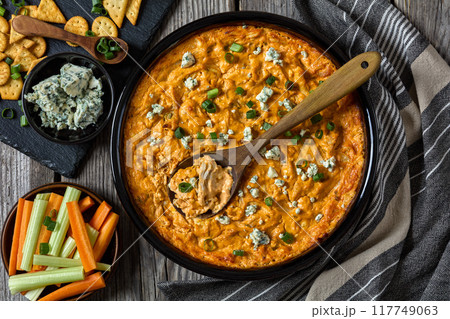 hot buffalo chicken dip in baking dish, top view 117749063