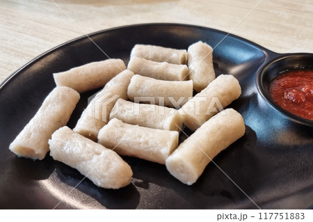 Close-up of steamed keropok lekor, popular traditional delicacy snack in Kuala Terengganu, Malaysia Close-up of steamed keropok lekor, popular traditional delicacy snack in Kuala Terengganu, Malaysia 117751883
