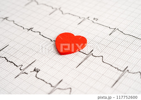 Electrocardiogram (ECG) graph paper with red heart, heart wave, heart attack, cardiogram report. 117752600