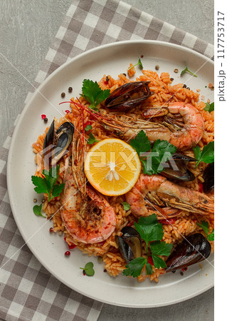 Seafood paella, shrimp and mussels risotto, rice, homemade, top view, no people, 117753717
