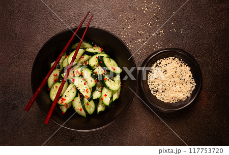 Chinese salad, cucumbers with chili pepper and sesame seeds, homemade, no people, 117753720
