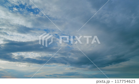 Majestic sunset or sunrise landscape amazing light of nature cloudscape sky and clouds moving. Timelapse. 117754625