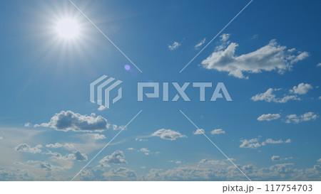 Light blue and white colours of real skies with clouds. Timelapse. 117754703