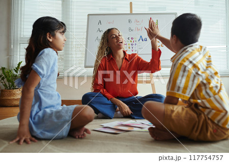 Teaching Alphabet to Children in Bright Classroom Teaching Alphabet to Children in Bright Classroom 117754757