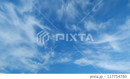 Sky with bautiful silky clouds. Puffy fluffy cumulus or cirrocumulus clouds. Timelapse. Sky with bautiful silky clouds. Puffy fluffy cumulus or cirrocumulus clouds. Timelapse. 117754780