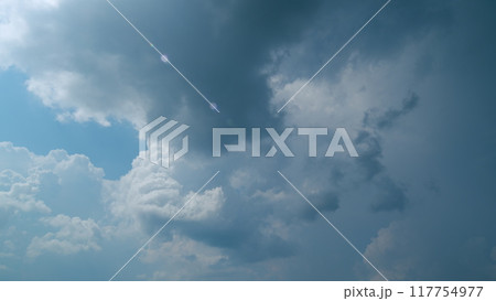 Cumulus cloud cloudscape. Slow rolling clouds. Filming of cumulonimbus cloud movement. Timelapse. 117754977