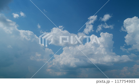 Cumulonimbus cloud and blue sky. Beautiful summer cumulonimbus cloud flowing through blue sky. Timelapse. Cumulonimbus cloud and blue sky. Beautiful summer cumulonimbus cloud flowing through blue sky. Timelapse. 117754985