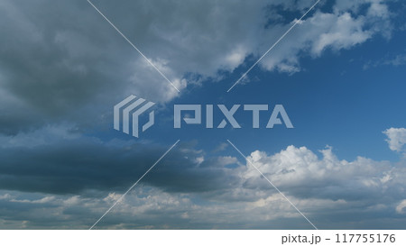 Dramatic sky. Sometimes heavy clouds mass charged. Dark stormy sky with gray cumulus rain clouds. Timelapse. 117755176