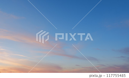 Purple pink blue sunset sky clouds. Clouds with pink, purple and dark colors at sunset sky. Wide shot. Purple pink blue sunset sky clouds. Clouds with pink, purple and dark colors at sunset sky. Wide shot. 117755485