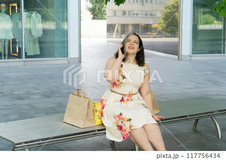 Happy woman shopping Happy woman shopping 117756434