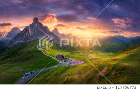 Aerial view of high mountains, golden sunlight at sunset 117756772