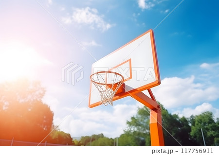 Basketball hoop on the outdoor playground on a sunny day 117756911