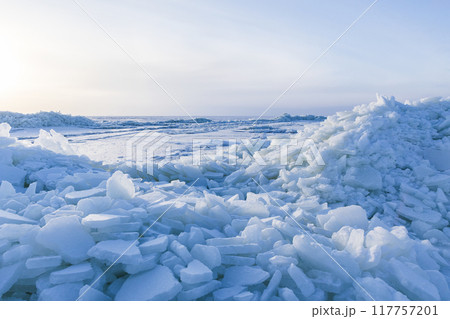 Winter landscape. Ice hummocks covered with snow 117757201