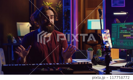 Piano teacher conducting online singing lesson for all people on internet, sharing valuable insights, and techniques in playing electronic keyboard notes. Social media educational video. Camera A. 117758772