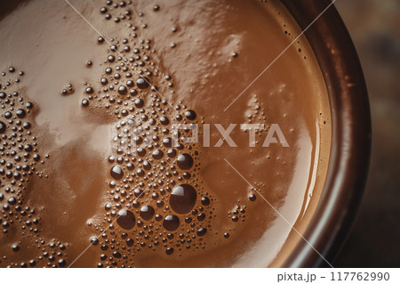 ホットチョコレートをマクロ撮影したクローズアップの背景テクスチャ画像	 117762990