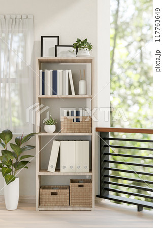A wooden shelf with books and decor in a contemporary bright room at home. 117763649