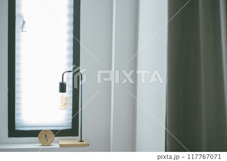 home interior with minimal clock and lamp in modern living room home interior with minimal clock and lamp in modern living room 117767071