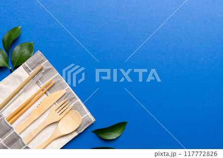 Eco friendly reusable recyclable white eco bag with kitchenware on Colored background. Concept zero waste 117772826