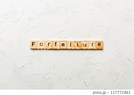 forfeiture word written on wood block. forfeiture text on table, concept forfeiture word written on wood block. forfeiture text on table, concept 117772861