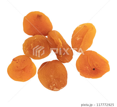 heap of dried apricots isolated on white background 117772925