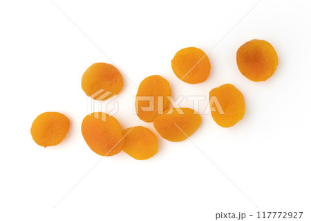 heap of dried apricots isolated on white background 117772927