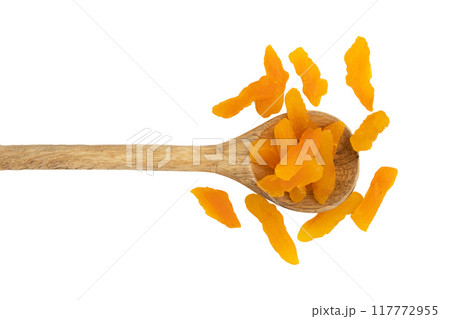 dried apricots cut into pieces isolated on white dried apricots cut into pieces isolated on white 117772955
