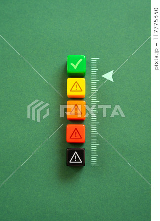 Acceptable level. Scale with warnings. Security. On the verge of moving from green to yellow alert level. Safety system. 117775350