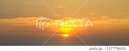 The morning sky looked like a bright sky. Wide photo. The sunrise is decorated with clouds in various shapes. 117776026