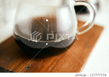 black drip coffee in glass server 117777158