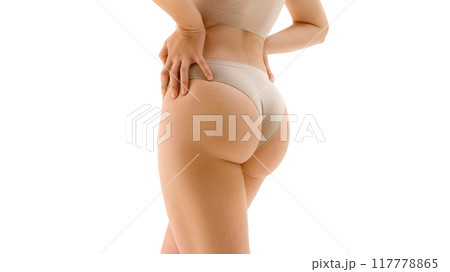 Anti-cellulite treatment, body care. Cropped image of female body, buttocks, model posing in underwear isolated on white background 117778865